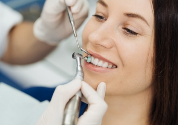 Patient receiving scaling and root planing treatment