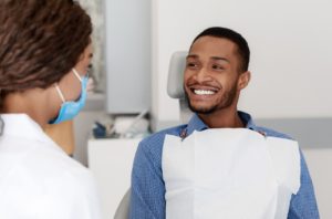 a patient during their cosmetic dental consultation