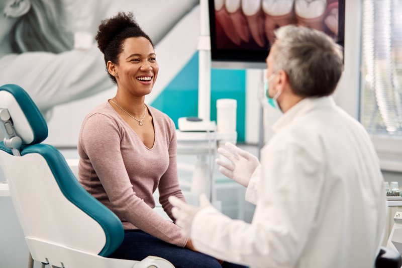 patient talking to their dentist